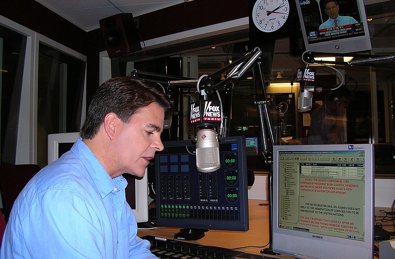 This Fox News photo shows anchor Gregg Jarrett rehearsing in 2005 for the debut of Fox News Radio's five-minute newscast. Jarrett was jailed Wednesday after being arrested in a bar at Minneapolis-St. Paul Airport.
