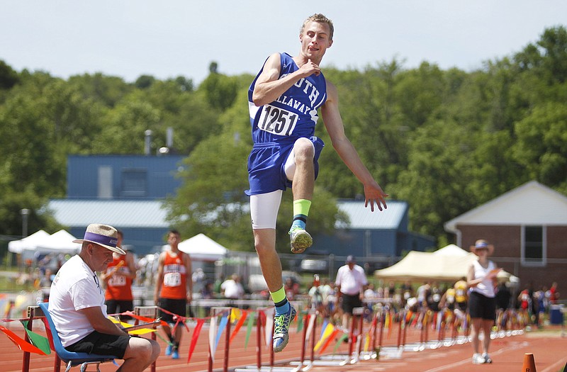 Garner Rudroff of South Callaway soars toward the pit during the Class 2 boys long jump Friday at Dwight T. Reed Stadium.