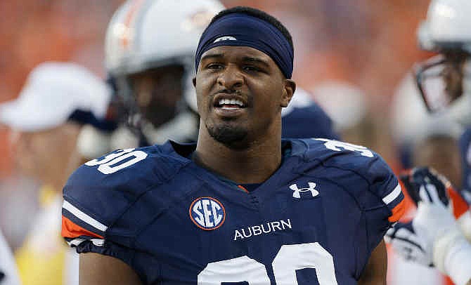  In this Sept. 14, 2013, file photo, Auburn defensive end Dee Ford (30) watches from the sidelines in the first half of an NCAA college football game against Mississippi State in Auburn, Ala. The Kansas City Chiefs signed Ford, their first-round pick on Saturday, May 24, 2014, putting the final player from this year's draft class under contract as the team began a three-day rookie minicamp.