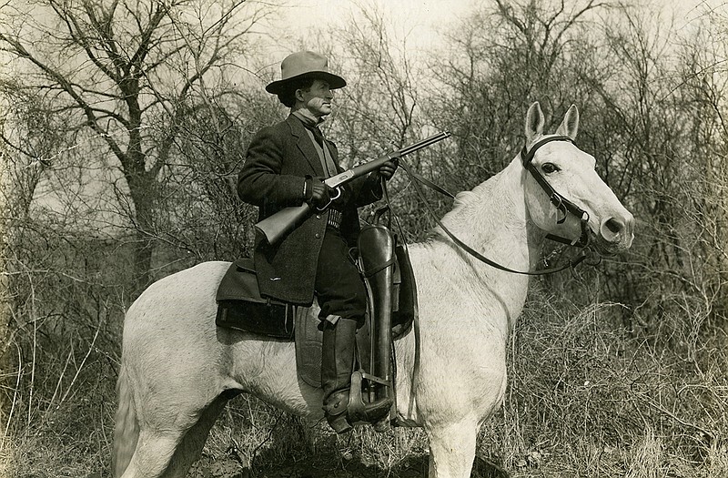 This image provided by the Oklahoma Historical Society shows Al Jennings in the Winter of 1913-14. A pistol, below, and other possessions belonging to the one-time Old West outlaw who later ran for governor of Oklahoma and became a film actor are going up for auction next month.
