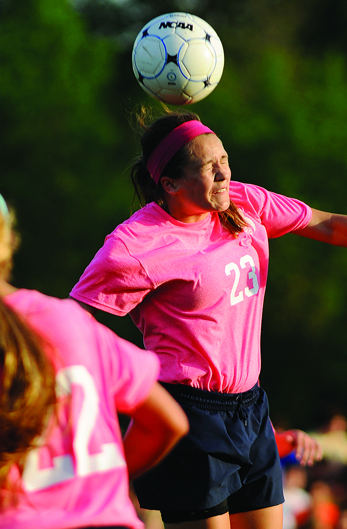 Emma Wyrick of Helias heads a ball during a game this season at the 179 Soccer Park.