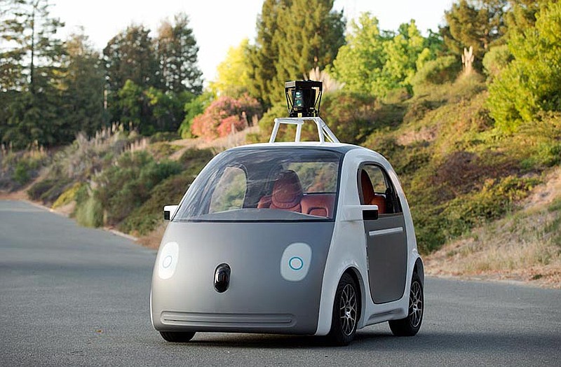 This image provided by Google shows a very early version of Google's prototype self-driving car. The two-seater won't be sold publicly, but Google hopes by this time next year, 100 prototypes will be on public roads.