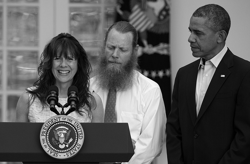 Accompanied by President Barack Obama, Jani Bergdahl, and Bob Bergdahl speak during a news conference about the release of their son, U.S. Army Sgt. Bowe Bergdahl. 