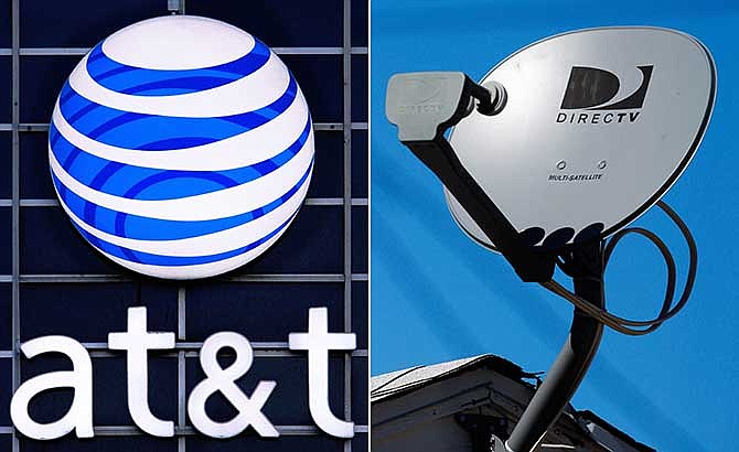 This combo made from file photos shows the AT&T logo on the side of a corporate office in Springfield, Illinois, left, and a DirecTV satellite dish atop a home in Los Angeles. 