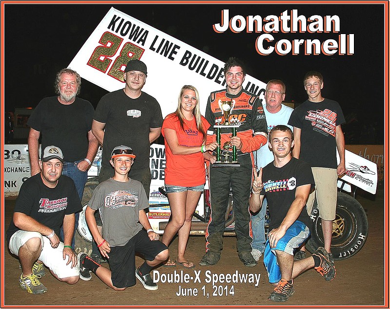 Jonathan Cornell, Sedalia, who won the 360 Winged Sprint main event Sunday, June 1, at the Double-X Speedway, California,Â is joined byÂ friends and family as he accepts his trophy from Speedway Trophy Girl Kelsey Brauner, California.Â 
