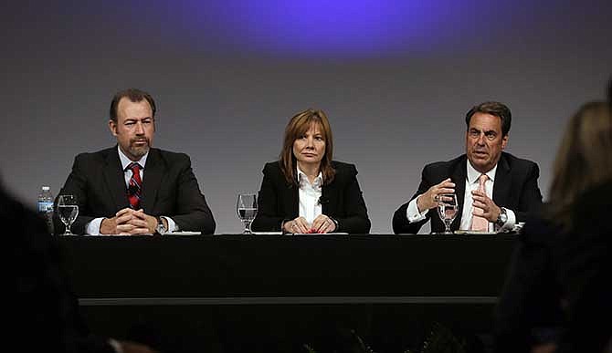 General Motors President Dan Ammann, left, CEO Mary Barra, and Executive Vice President Mark Reuss, hold a press conference at the General Motors Technical Center in Warren, Mich., Thursday, June 5, 2014. Barra said 15 employees - many of them senior legal and engineering executives - have been forced out of the company for failing to disclose a defect with ignition switches, which the company links to 13 deaths. Five other employees have been disciplined.