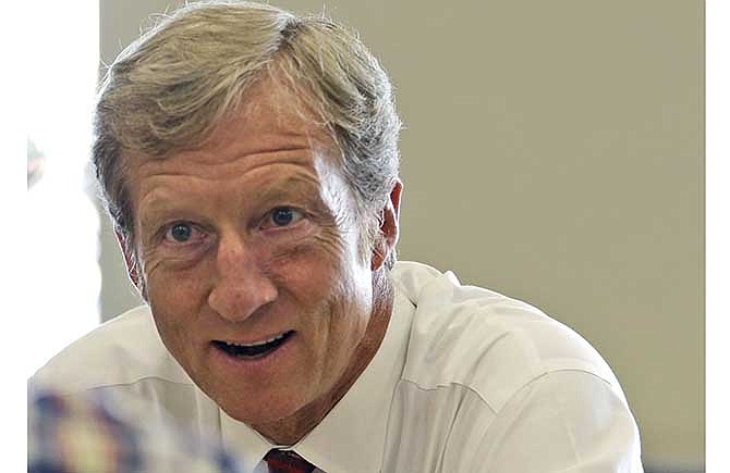 In this Sept. 25, 2013, file photo, businessman Tom Steyer talks during a meeting to announce the launch of a group called Virginians for Clean Government at Virginia Commonwealth University in Richmond, Va.