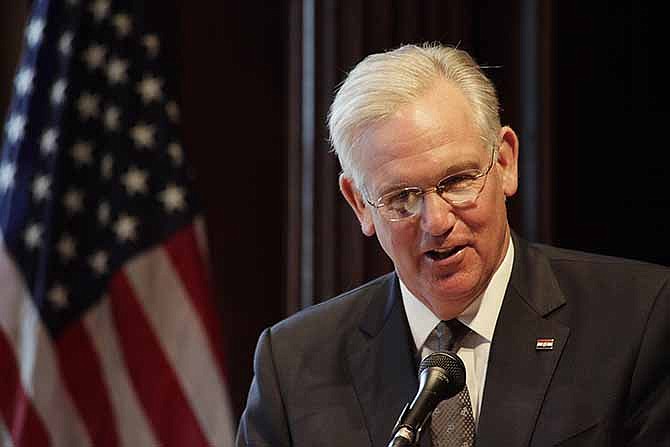 Missouri Gov. Jay Nixon speaks during a news conference, Wednesday, June 11, 2014 in Jefferson City, Mo.