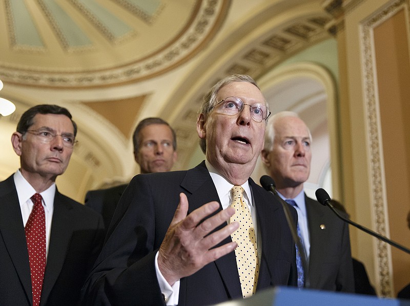 Senate Minority Leader Mitch McConnell of Ky., faces reporters on Capitol Hill in Washington, Tuesday, after a Republican caucus meeting. Responding to the public outcry over lax care at Veterans Affairs health facilities, leaders of both parties plan debate soon on a bill to help vets waiting for months to get medical appointments. 