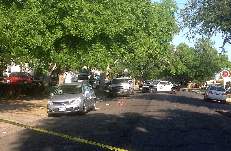 Police rope off the scene where burglary defendant Bobby Lee Pearson was stabbed to death. Pearson walked out of a Central California courtroom a free man after a jury mistakenly signed a not-guilty verdict form. Hours later, he was stabbed to death in a fight. 