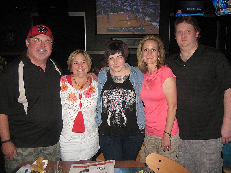 Mary Pat Detten, middle, poses with her birth parents, Ashley Becker, far right, and Vickie Wieberg, second from right, and her adoptive parents, Pam and Russ Detten. Mary Pat met with her birth parents last week for the first time since she was given up for adoption 22 years ago.