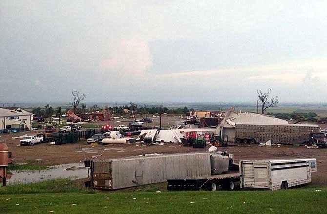 This photo provided by KDLT shows damaged buildings in Wessington Springs, S.D., on Wednesday, June 18, 2014. A tornado hit Wessington Springs Wednesday, damaging homes and businesses and injuring at least one person, according to the National Weather Service and a hospital spokeswoman. (AP Photo/KDLT, Brian Kirk)