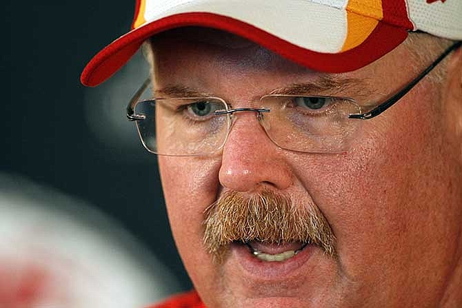 Kansas City Chiefs head coach Andy Reid talks about his team's progress at a press conference at the end of a three day NFL football minicamp at the team's practice facility in Kansas City, Mo., Thursday, June 19, 2014.