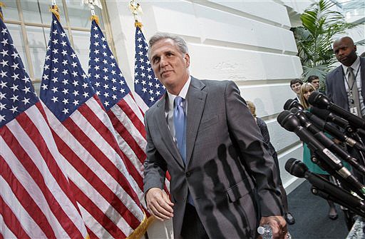 House Majority Whip Kevin McCarthy of Calif. leaves a  Republican Conference meeting on Capitol Hill in Washington Wednesday, as candidates vying for House GOP leadership posts make their pitches to the rank-and-file in the tumultuous aftermath of House Majority Leader Eric Cantor's sudden loss last week in his Virginia primary race.