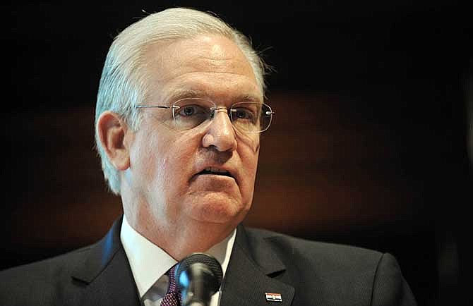 Gov. Jay Nixon speaks during a news conference held at the Capitol on Tuesday, June 24, 2014, in Jefferson City, Mo. 