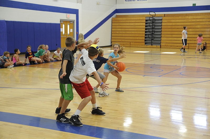 More than 50 young athletes have been learning about their favorite sports and faith lessons during the Sports Crusaders basketball, baseball/softball and cheerleading camps this week at Russellville High School.