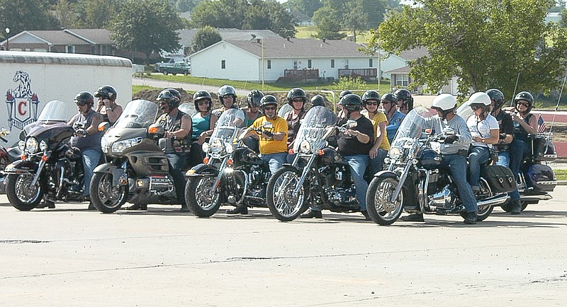 The bikers are lined up at the California High School parking lot to begin the Motorcycle Poker Run Saturday, June 21.