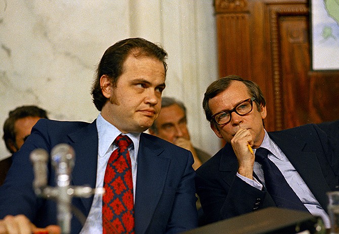 This May 17, 1973 photo shows Fred D. Thompson, chief minority counsel of the Senate Watergate Committee, left, talking with Sen. Howard Baker, R-Tenn. during the Watergate hearings on Capitol Hill in Washington. Baker, who asked what President Richard Nixon knew about Watergate, has died. He was 88. 