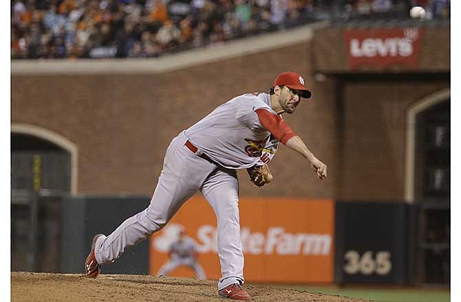 St. Louis Cardinals starting pitcher Adam Wainwright throws in the eighth inning of their baseball game against the San Francisco Giants Wednesday, July 2, 2014, in San Francisco. 