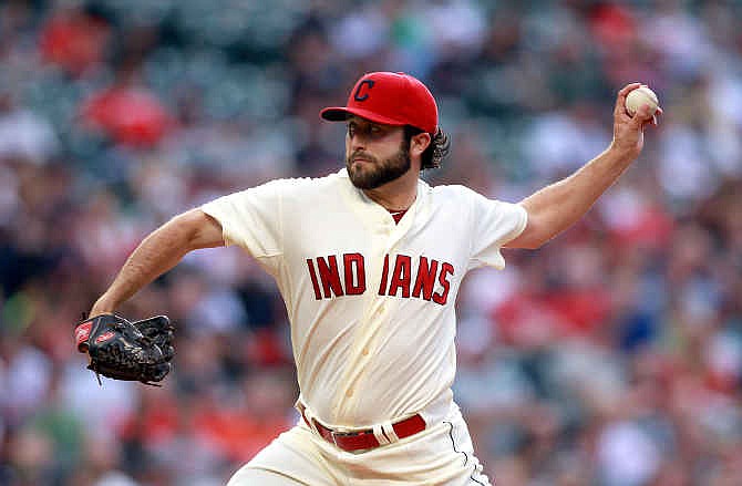 Cleveland Indians' starting pitcher T.J. House delivers in the first inning of a baseball game against the Kansas City Royals Saturday July 5, 2014, in Cleveland.
