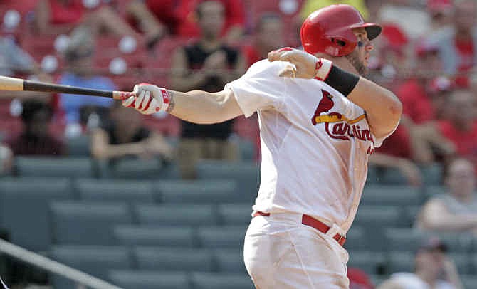 St. Louis Cardinals' Matt Adams bats in the ninth inning of a baseball game against the Miami Marlins, Sunday, July 6, 2014, in St. Louis. Adams went four for five with a run scored in a losing effort as the Marlins beat the Cardinals 8-4. 