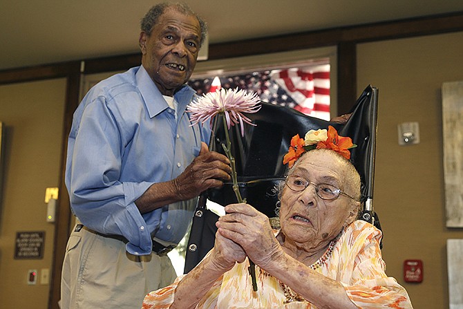 Gertrude Weaver, right, talks with her son Joe Weaver, July 3 at Silver Oaks Health and Rehabilitation Center in Camden, Arkansas a day before her 116th birthday. The Gerontology Research Group says Weaver is the oldest person in the United States and second-oldest person in the world. 