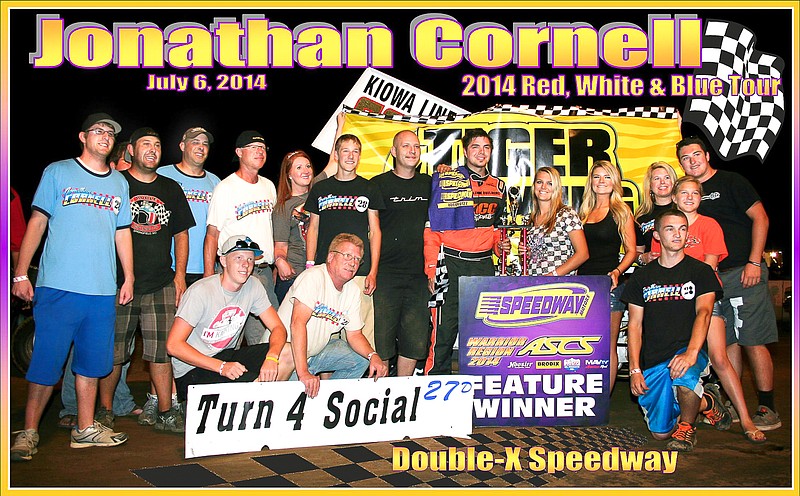 Sedalia sprint car driver Jonathan Cornell is joined by crew members, friends and family as he is presented the trophy for clenching the 2014 Red, White and Blue Tour championship Sunday night at the Double-X Speedway, California.

