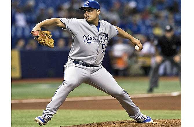 Kansas City Royals starter Jason Vargas pitches against the Tampa Bay Rays during the fourth inning of a baseball game Tuesday, July 8, 2014 in St. Petersburg, Fla.