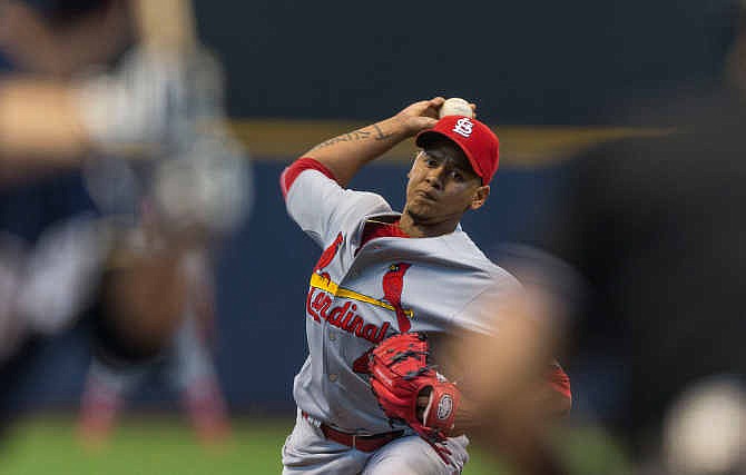 St. Louis Cardinals' Carlos Martinez pitches to a Milwaukee Brewers' batter during the first inning of a baseball game Sunday, July 13, 2014, in Milwaukee. 