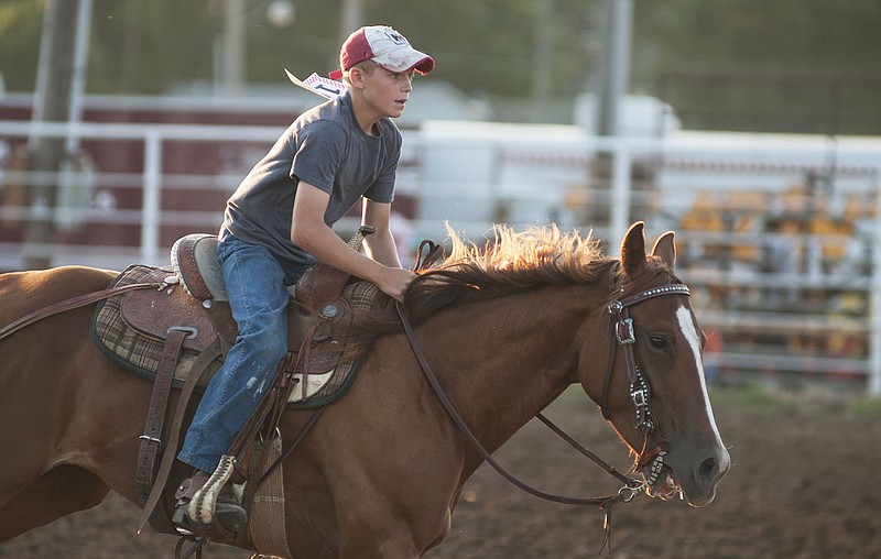 Zebediah Meffert, 13, of Auxvasse rides his horse Fancy during the 2014 Callaway County Youth Expo Fun Horse Show on Thursday.