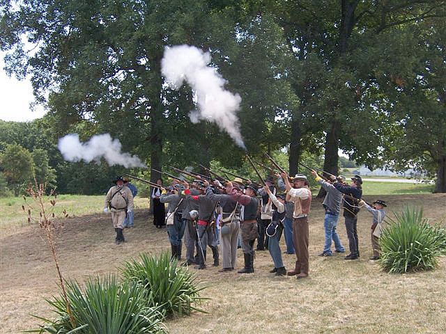 Fired salute at the July 28, 2012, dedication of two interpretive panels on the Gray Ghosts Trail at the Moore's Mill battle site.