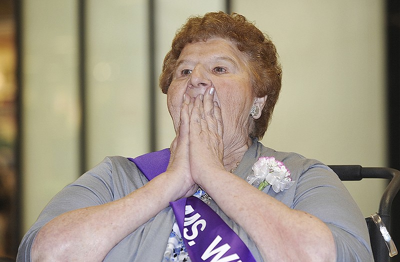 Dorothy Veit reacts to hearing her name called at the winner of the Ms. Nursing Home Pageant.