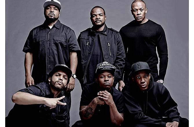 This photo released by Universal Pictures shows the cast and filmmakers of "Straight Outta Compton, " clockwise, from top left, producer Ice Cube, director F. Gary Gray, producer Dr. Dre, Corey Hawkins (Dr. Dre), Jason Mitchell (Eazy-E) and O'Shea Jackson Jr. (Ice Cube). 