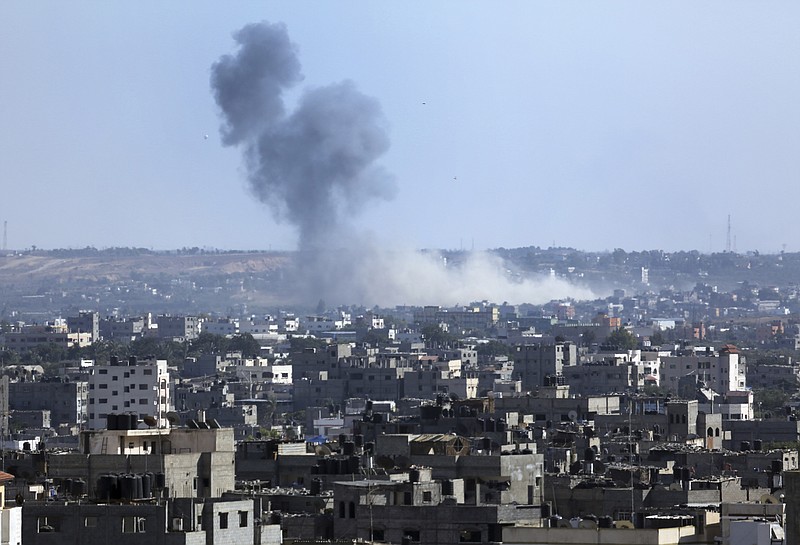 Smoke rises after an Israeli missile strike hit the northern Gaza Strip, on Thursday. Hamas fired 10 rockets at Israel after the end of the temporary truce, while Israel launched two airstrikes at the Gaza Strip, security officials said.