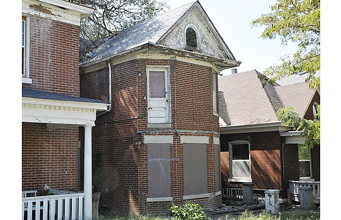 This Sept. 19, 2012 file photo shows a vacant building in the 600 block of East McCarty Street before it was razed by the Old Town Revitalization Company.