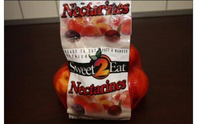 Wawona Packing Co. voluntarily recalled plums, pluots, white or yellow peaches, and white or yellow nectarines (like the package pictured above), due to fears of possible contamination by Listeria monocytogenes bacteria.
(Photo credit: Wawona Packing)