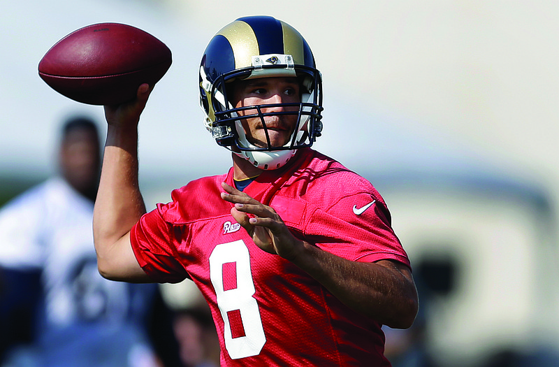 Rams quarterback Sam Bradford throws during training camp Friday at the team's practice facility in St. Louis. 