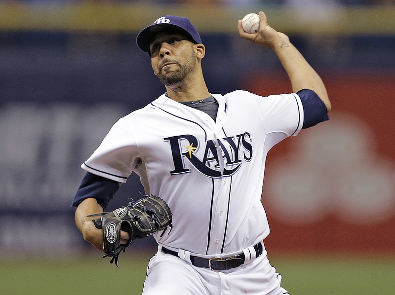 Tampa Bay Rays starting pitcher David Price delivers to the Boston Red Sox during the first inning of a baseball game on Friday, July 25, 2014, in St. Petersburg, Fla.