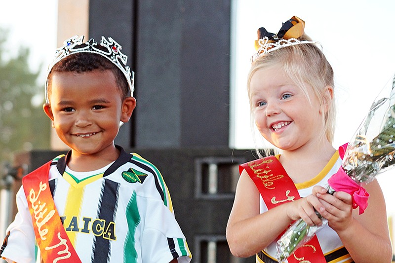 Newly crowned Little Mr. And Miss Cole County Jamere "JD" Edwards and Brianna Mae Smith are all smiles after the pageant.