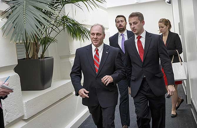 Rep. Steve Scalise, R-La., the new House GOP whip, leaves a closed-door Republican strategy session on the immigration crisis at the U.S.-Mexico border after last-minute maneuvering failed to lock down conservative support for a planned vote, at the Capitol in Washington, Thursday, July 31, 2014. The surprise developments, coming on Congress' final day of action ahead of a five-week summer recess, were an embarrassing setback for Speaker John Boehner and his leadership team as a small group of tea party lawmakers once again upset their plans.