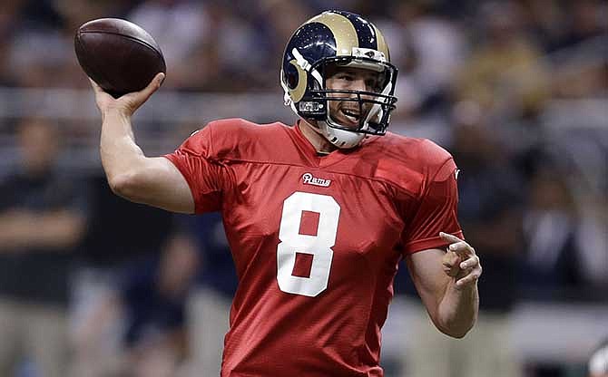 St. Louis Rams quarterback Sam Bradford throws during NFL football training camp at Edward Jones Dome, Saturday, Aug. 2, 2014, in St. Louis.