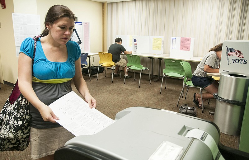 Lindsey Eick of Fulton casts her ballot Tuesday afternoon at the Callaway County Public Library. The library, Fulton City Hall, First Baptist Church and Southside Baptist Church acted as the polling places for the city of Fulton.