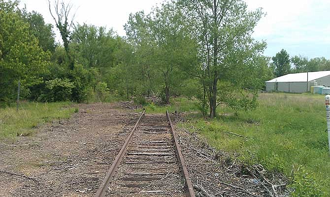 Tracks on the former Rock Island Railroad right of way in Eldon are shown in this May 31, 2012, file photo. 