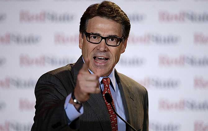 This Aug. 8, 2014, file photo shows Governor Rick Perry as he speaks at the 2014 Red State Gathering, in Fort Worth, Texas.