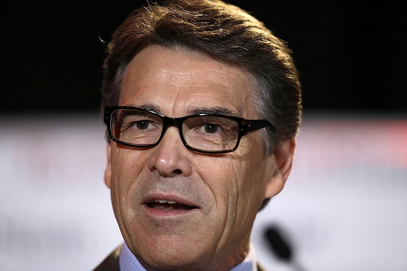 Texas Gov. Rick Perry delivers a speech to nearly 300 in attendance at the 2014 RedState Gathering, in Fort Worth, Texas. Perry was indicted on Friday for abuse of power after carrying out a threat to veto funding for state public corruption prosecutors.