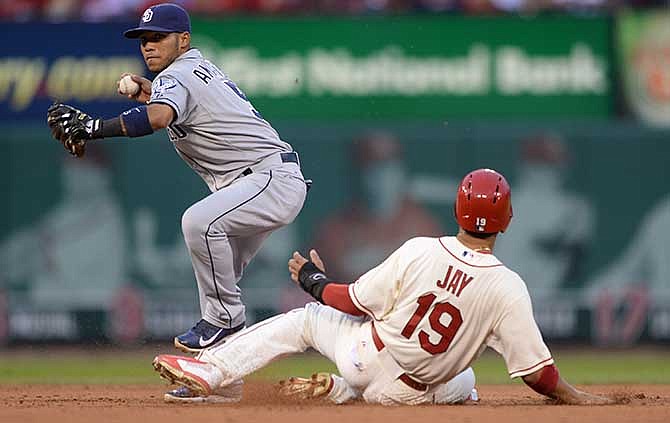 St. Louis Cardinals' Jon Jay (19) is forced out at second by San Diego Padres' Alexi Amarista, left, during the second inning in a baseball game, Saturday, Aug. 16, 2014, at Busch Stadium in St. Louis. Shelby Miller was safe at first.