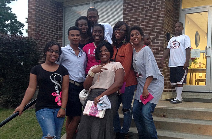 Co-Pastor Ciara Hardin poses with youth members of Second Baptist Church at a youth revival to celebrate going back to school. The revival was part of a weekend of events.
