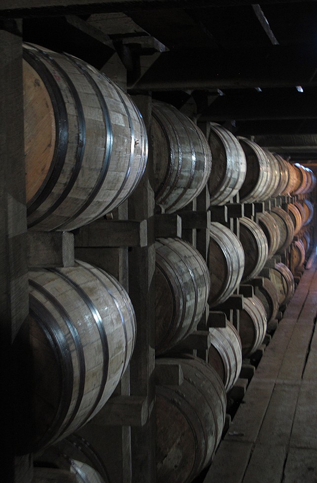 Bourbon supplies age in barrels at the Jim Beam distillery in Clermont, Ky. Kentucky bourbon makers have stashed away their largest stockpiles in more than a generation due to resurgent demand for the venerable brown spirit.
