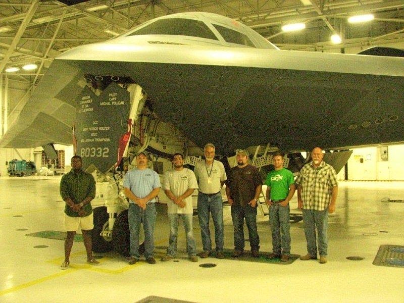 Shown with the B2 Bomber are Tobi Olofintuyi, Michael Gober, Andres Aguero, Bryan Schlesselman, Jay Smith, Jeff Neal and Gene Wickham from the Cargill - Calfifornia location.