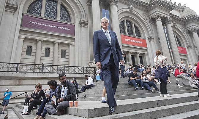 This photo taken June 11, 2014 shows David Koch outside the Metropolitan Museum of Art in New York City. They're demonized by Democrats, who lack a liberal equal to counter their weight, and not entirely understood by Republicans, who benefit from their seemingly limitless donations. Koch, the executive vice president of Wichita's Koch Industries, is a trustee of the museum.